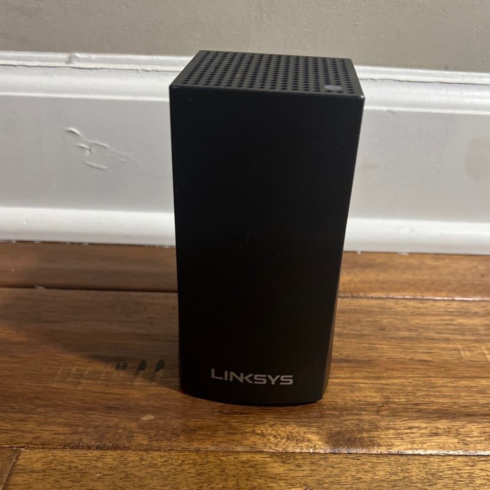Linksys WiFi router with power plug